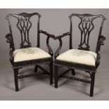A pair of 19th century Irish carved mahogany armchairs. With pierced splats, gadrooned mouldings and