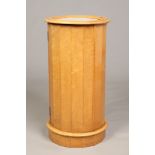 A birds eye maple reeded column marble top pot cupboard, 75cm.