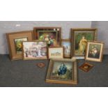A group lot of pictures and prints to include still life oil painting of flowers.