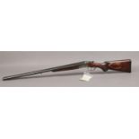 A deactivated Hubertus side by side double trigger 12 bore shot gun with deactivation certificate,