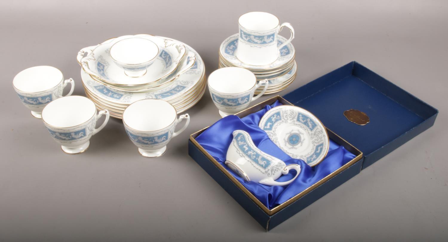 A collection of Wedgwood bone china teawares in the Revelry design, to include boxed sauceboat. (