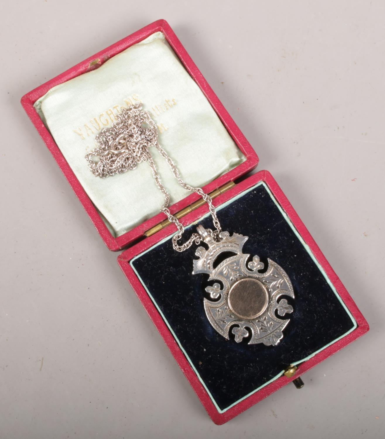 An early 20th century silver fob, assayed Birmingham 1904 by William Adams Ltd. on white metal