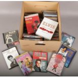 A box of Elvis Presley DVD's and CD's, Elvis Aloha from Hawaii Deluxe Edition dvd, Elvis in Fun in