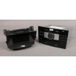 A Delphi Grundig CD30 head unit for Vauxhall / Opel Corsa / Astra to include Johnson controls ABS