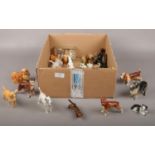 A collection of ceramic dog figure's Beswick, foreign examples