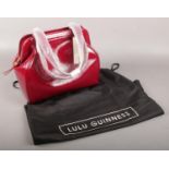 A red garnet leather Lulu Guinness handbag in the Paula style, with dust bag. New and unused.