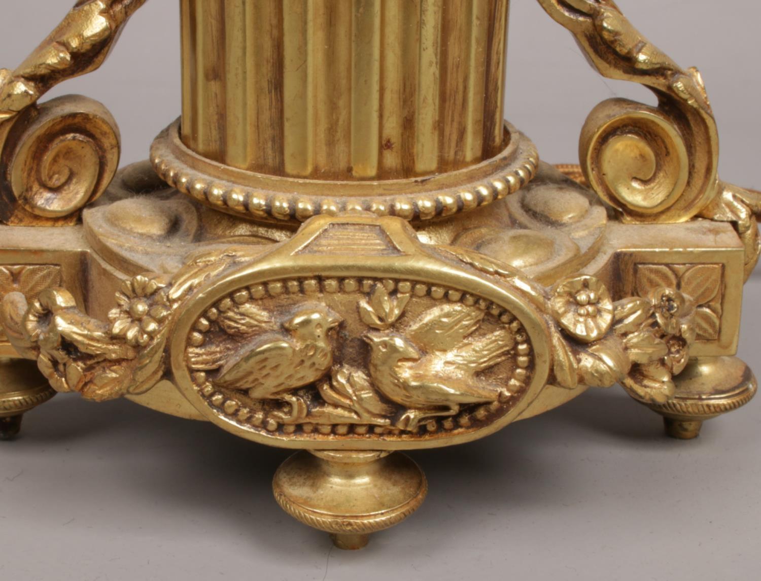 A French gilt bronze three branch tablelamp. With leaf moulded sconces and raised on a column plinth - Image 2 of 5