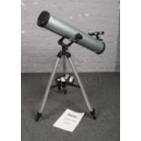 A Vivitar telescope model 70076 on stand, with lenses and instruction manual.