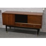 A G plan retro teak sideboard with painted sliding door raised on painted brass foot legs, 144cm x