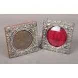 Two small Edwardian silver mounted easel photograph frames. Birmingham 1901 and 1904. Both worn