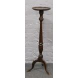 A Victorian mahogany jardiniere stand. (Height 108cm). Polish badly damaged to top. Leg re-glued.