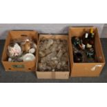 Three boxes of misc to include glass jars, bottles of chardonnay, ornamental cat etc.