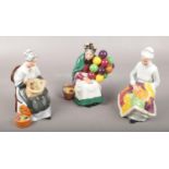 Three Royal Doulton ceramic figurines to include The old balloon seller example etc.