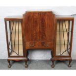 A mahogany side by side display cabinet raised on ball and claw feet. 125cm x 137 cm.