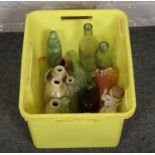 Eight Victorian glass advertising bottles along with eight stoneware jars.