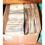 A box of single records mostly original sleeves.