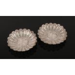 A pair of Maltese silver small lobed filigree dishes. Punch marks to the centre rim, stamped 917, 46