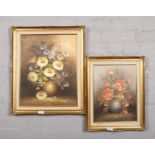 Two gilt frame oil on canvas, still life studies of flowers, signed B Leigh and E Green (Largest
