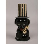 A Beatson Clark glass novelty scent bottle formed as a seated dog in a top hat, registered No to