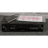 Toshiba DVD Video player/ video cassette recorder with remote control and instruction manual