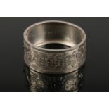 A Victorian silver cuff bracelet by G Loveridge & Co (George Loveridge). Engraved with a panel of