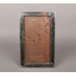 A George VI silver mounted rectangular easel photograph frame on oak back. Assayed Birmingham