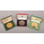 Royal Mint. Three cased medallions; Prince of Wales Investiture, 25th anniversary of the investature