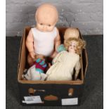 A box of dolls to include Armand Marseille example etc.