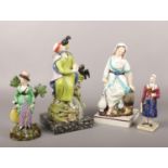 Four early 19th century Staffordshire pearlware figures including a pair of large religious