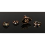 Four Victorian gold rings. Including an onyx lozenge shaped mourning ring, opal, pearl and turquoise