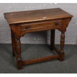 A solid oak single drawer side table. Possibly Old Charm, 90cm x 44cm.