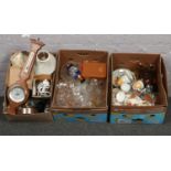 Three boxes of miscellaneous, ceramic tea sets, glasswares, bedside lamps, quartz alarm clocks etc