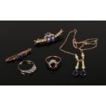 Five pieces of 9ct gold jewellery set with white and coloured paste stones. Including two bar