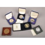 Six cased commemorative medals including Festival of Britain crown, three for the British Legion,