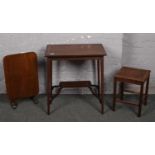 An Edwardian inlaid mahogany window table, on oak folding occasional table and a bur walnut effect