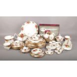 A Royal Albert old country roses part dinner service to include teapot, toast rack, boxed salad