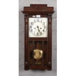 An Early 1900's H-A-C Cottage clock 8 Day time and strike in a mahogany case Very good working
