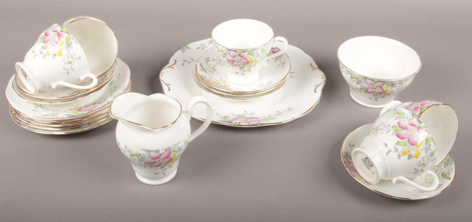 A Royal York bone china tea set, tea cups, saucers, side plates, large plate, milk jug, sugar bowl