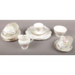 A Royal York bone china tea set, tea cups, saucers, side plates, large plate, milk jug, sugar bowl