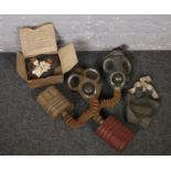 Three WWI gas masks to include boxed example.
