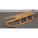 A vintage Davos wooden sledge.