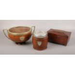 A Victorian mahogany tea caddy, along with an oak biscuit barrel and an oak twin handle presentation