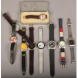 A collection of quartz wristwatches including Harry Potter and Wallace & Gromit in tin.