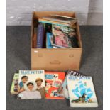 A box of books, Churchill The man of the century, Blue Peter the fourth & fifth book, Picture Show