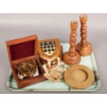 A tray of mainly wooden items including butter dish, pair of candlesticks, college plaques and a