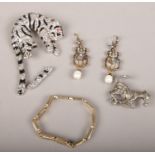 A dress jewellery brooch / pendant formed as a tiger, zebra brooch, gilt and white paste bracelet