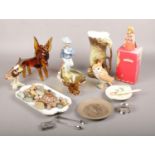 A mixed group of ceramics, glass and collectables to include Beswick, Goebel, Royal Doulton