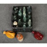 A box of mainly advertising glass bottles, to also include stoneware and Wade.