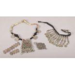 A collection of white metal jewellery, to include Eastern necklaces, filigree bracelet etc. Bracelet