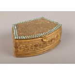 A early c20th gilt metal continental jewellery casket with tortoise bead decoration.